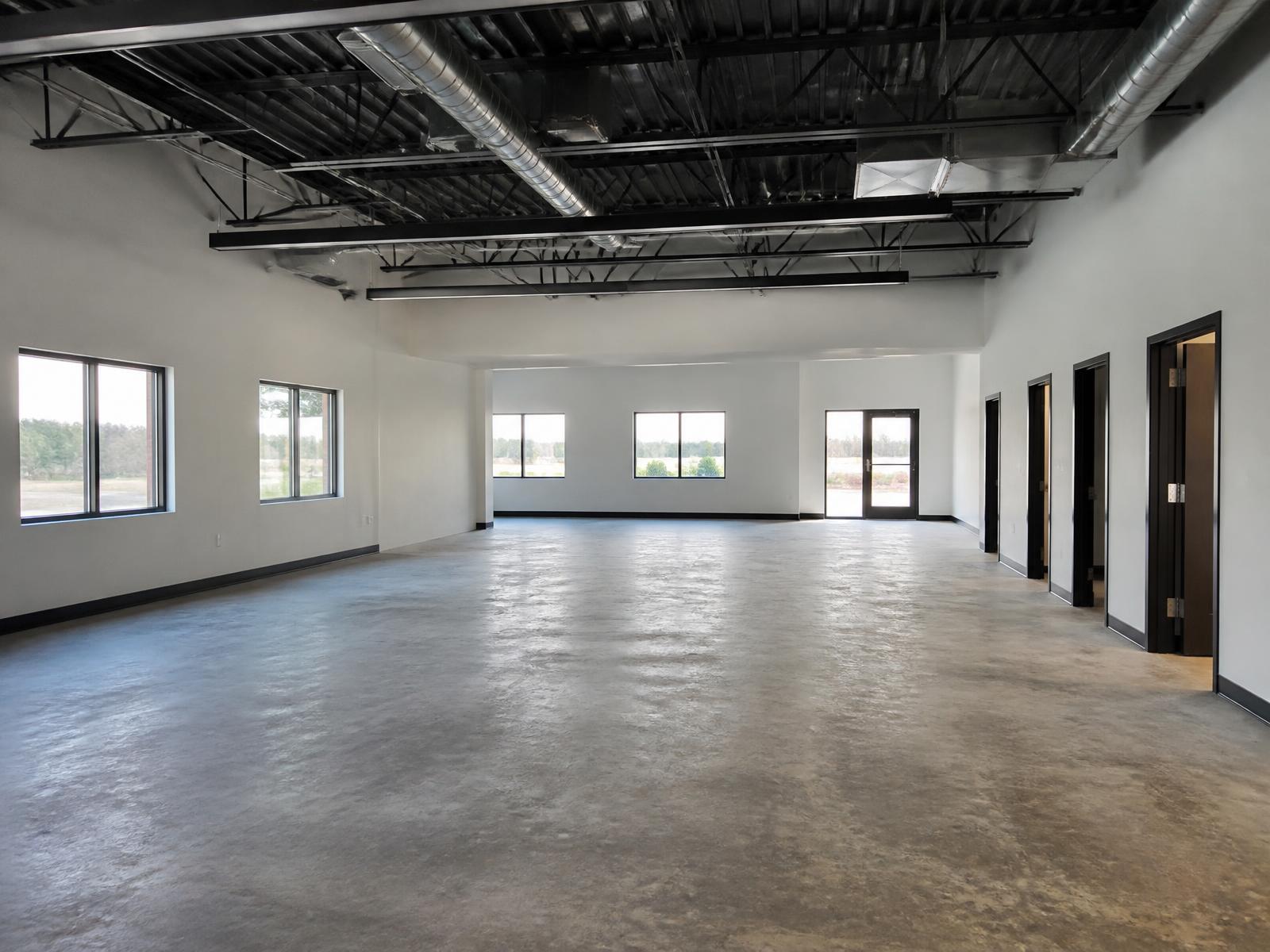 Illustrative view of an empty single-storey business centre interior